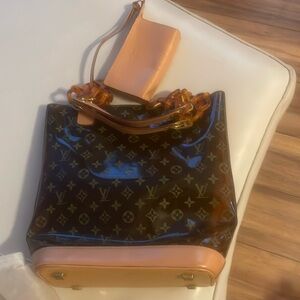 authentic LOUIS VUITTON Vinyl Cabas Ambre PM. Also original inside wallet
